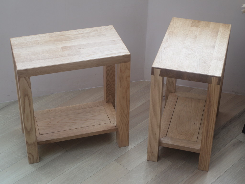 A pair of side tables